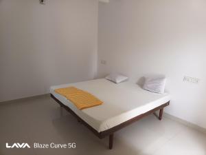 Ένα ή περισσότερα κρεβάτια σε δωμάτιο στο The Nest House Femily room +3 φωτογραφίες