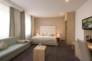 Postel nebo postele na pokoji v ubytování Best Western Hotel Lamm
