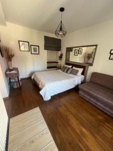 Cama ou camas em um quarto em Alkistis House