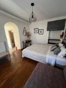 Cama ou camas em um quarto em Alkistis House