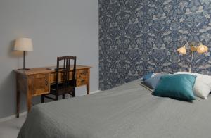 Ένα ή περισσότερα κρεβάτια σε δωμάτιο στο Casa Kaisa,cozy one-bedroom apartment, free parking