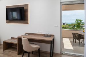 TV a/nebo společenská místnost v ubytování B&B Villa Perla