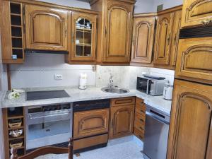 Dapur atau dapur kecil di Reina y Santa