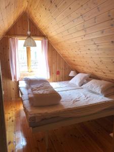 Postel nebo postele na pokoji v ubytování Semesterhus på landet