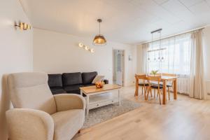 Posezení v ubytování Kuuse 4 Apartment with 2 bedrooms