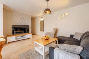 Posezení v ubytování Kuuse 4 Apartment with 2 bedrooms