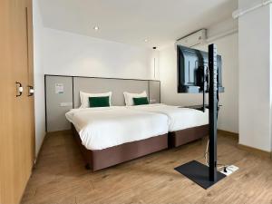 Ένα ή περισσότερα κρεβάτια σε δωμάτιο στο Pentafield City Residence +33 φωτογραφίες