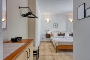 Postel nebo postele na pokoji v ubytování Guest House Jolanda