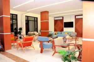 TV a/nebo společenská místnost v ubytování فندق لمسات الخير الفندقية