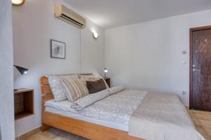 Postel nebo postele na pokoji v ubytování Guest House Jolanda