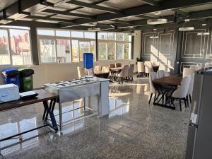 Galería fotográfica de Housr 36 Studio Rooms Bangalore Near Leela Palace en Bangalore