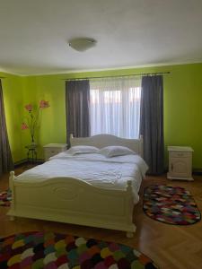 Ένα ή περισσότερα κρεβάτια σε δωμάτιο στο Casa GEDORG