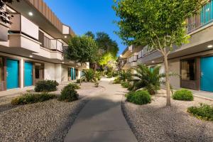 a walkway in front of a building at Ramada by Wyndham El Paso in El Paso
