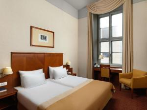 Posteľ alebo postele v izbe v ubytovaní Mercure Szekesfehervar Magyar Kiraly