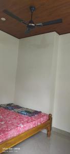 Letto o letti in una camera di His Grace Holiday Home - Nr to Malpe Beach