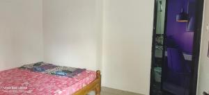 Letto o letti in una camera di His Grace Holiday Home - Nr to Malpe Beach