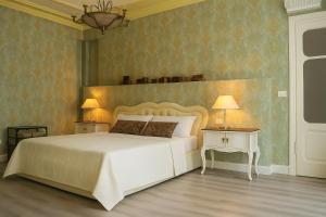 Postel nebo postele na pokoji v ubytování Miglioranzi Rooms