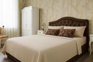 Postel nebo postele na pokoji v ubytování Miglioranzi Rooms