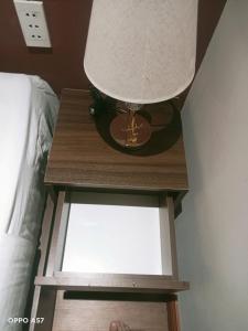 Una cama o camas en una habitación de Monarque Hotel 16