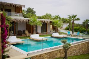 an image of a villa with a swimming pool at SANIMAR By Mono Alex in Kassandra