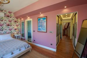 A bed or beds in a room at Villa Atlas