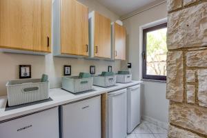 Kuchyň nebo kuchyňský kout v ubytování Guest House Jolanda