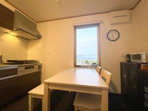 Kuchyň nebo kuchyňský kout v ubytování 富良野優中富良野