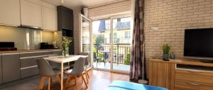 Kuchyňa alebo kuchynka v ubytovaní Apartament Juzo Villa Mountain View