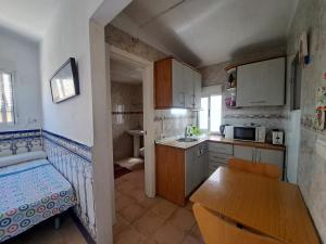 Kuchyňa alebo kuchynka v ubytovaní Hostel El Cascabel + 16 fotografií