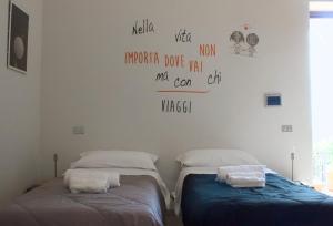 Katil atau katil-katil dalam bilik di Esplora l'Abruzzo da Teate Country House