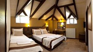Postelja oz. postelje v sobi nastanitve Assos Behram Special Class Hotel Adults Only