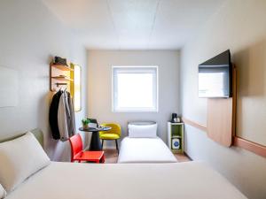 Ein Bett oder Betten in einem Zimmer der Unterkunft Ibis Budget Bilbao Barakaldo