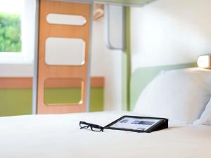 Ein Bett oder Betten in einem Zimmer der Unterkunft Ibis Budget Bilbao Barakaldo