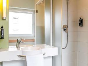 Ein Badezimmer in der Unterkunft Ibis Budget Bilbao Barakaldo