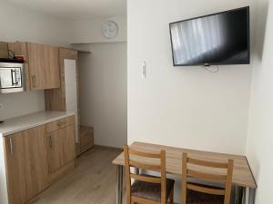 A kitchen or kitchenette at Csillag Virág Vendégház