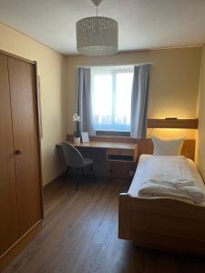 Voodi või voodid majutusasutuse Hotel Falknerei Galina toas