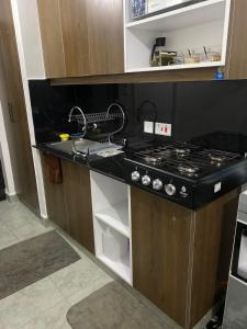 Η κουζίνα ή μικρή κουζίνα στο Haven Homes