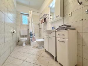 Koupelna v ubytování Apartments Nikolic + 52 fotografií