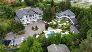 an aerial view of a house with a yard at Rakovica Resort in Sarajevo