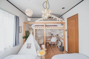 Postel nebo postele na pokoji v ubytování AKIYATO DATE DREAM DATE home