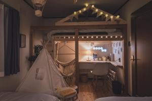 Postel nebo postele na pokoji v ubytování AKIYATO DATE DREAM DATE home