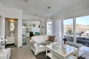 Posezení v ubytování Helios Studios & Apartments