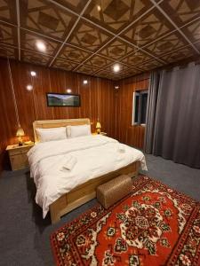 Postel nebo postele na pokoji v ubytování Mindok Guest House