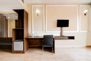 TV a/nebo společenská místnost v ubytování Townhouse OAK Nilay Residency
