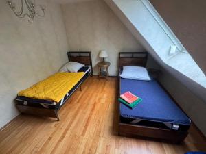 Postel nebo postele na pokoji v ubytování Bärenheim