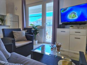 TV/Unterhaltungsangebot in der Unterkunft Apartment Villa Bralo
