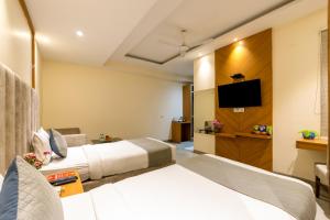TV a/nebo společenská místnost v ubytování Hotel Stanley By SMART GROUP