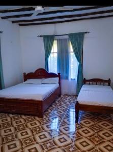 Postel nebo postele na pokoji v ubytování Villa Vanessa