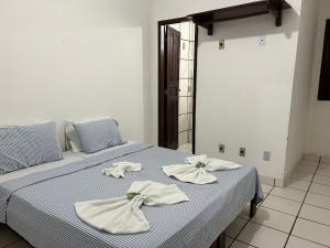 Postel nebo postele na pokoji v ubytování Pousada Recanto do Norte