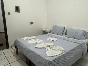 Postel nebo postele na pokoji v ubytování Pousada Recanto do Norte